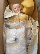 Large lot of dolls and stuffed animals