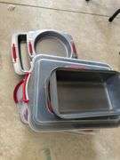 Lot of baking pans and covered kitchenware