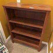 Pressed wood book shelf