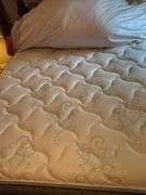 Bed including mattress, box spring, linens and pillows