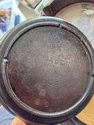 Group of cast iron skillets as shown