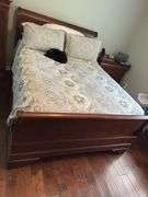 Queen size sleigh bed - frame only. No mattress, box spring or linens.