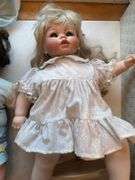 Large lot of dolls and stuffed animals