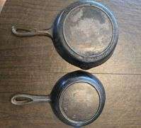 2 small cast iron pans