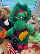 Beanie babies and Toy Story dolls as shown