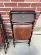 2 folding tables and 4 chairs