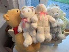 Large lot of dolls and stuffed animals