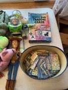 Beanie babies and Toy Story dolls as shown