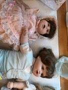Large lot of dolls and stuffed animals