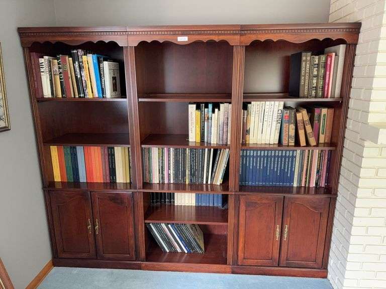 3 piece “cherry” finish book cases. Contents sold separately. You are bidding on the 3 shelving units only. Each unit is 35” x 76” tall