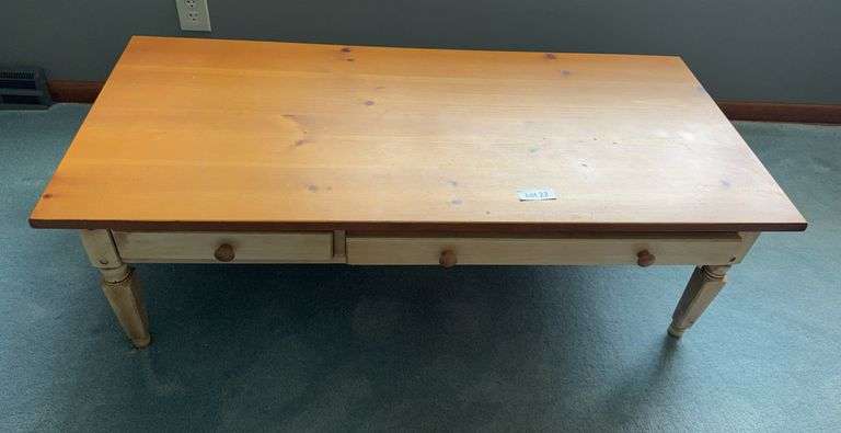 Low Bassett brand coffee table. 51” wide by 15” tall by 23” across