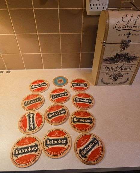 Vintage Heineken coasters and empty wine case