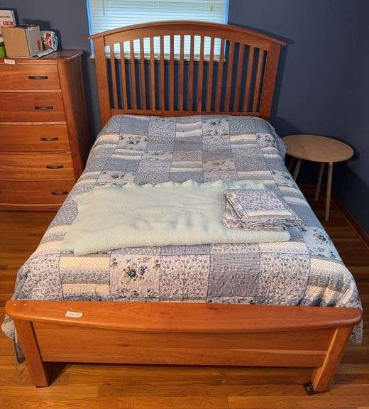 Full size bed that matches dresser sold separately in lot 36. Mattress and box spring will need to be replaced