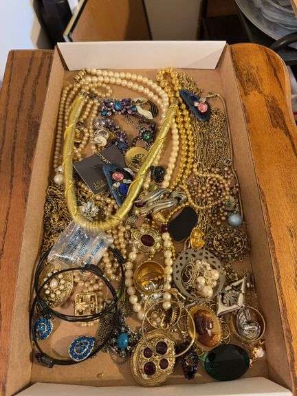 Costume jewelry as shown. All items reacted to earth magnet.