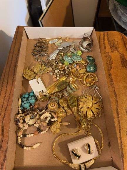 Costume jewelry as shown. All items reacted to earth magnet