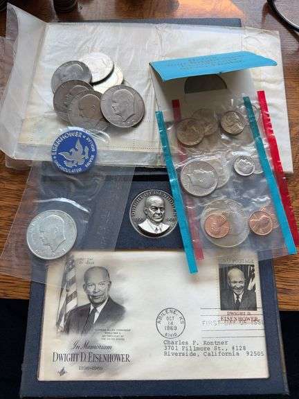 Eisenhower dollars and stamps with proof sets