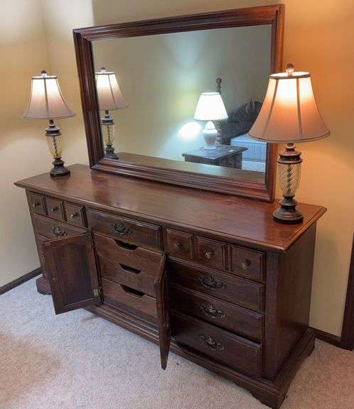 Dark brown dresser with mirror. Lamps sold separately