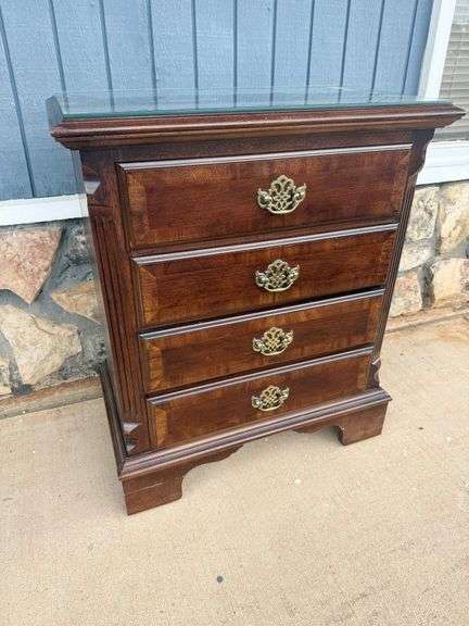 Traditional Four-Drawer Nightstand - Ready for Your Bedside! image