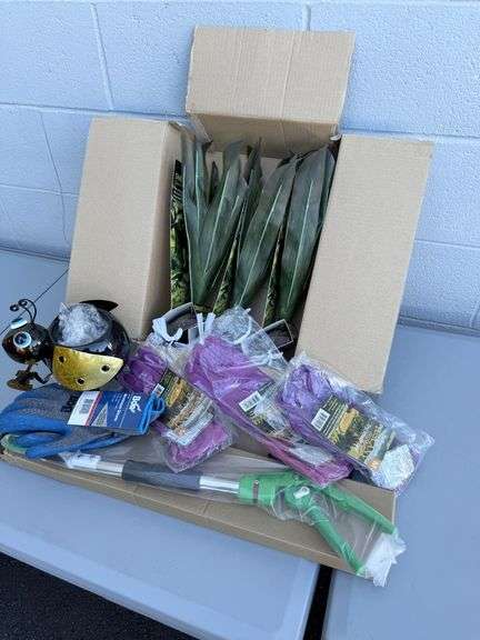 Gardening Gear Bonanza: Gloves, Plants, and a Bug-Eyed Buddy!