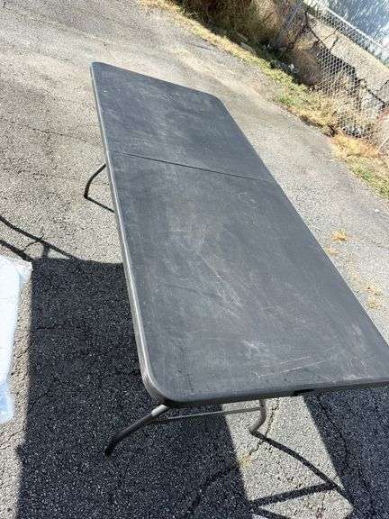 Foldable Black Table - Ready for Its Next Big Event! image
