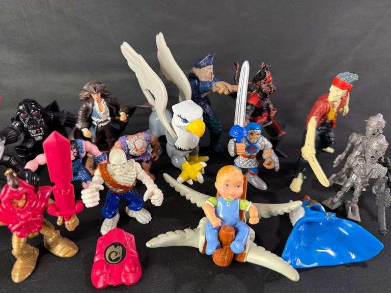 Assorted Toy Action Figures: A Hodgepodge of Heroes and Hooligans! image