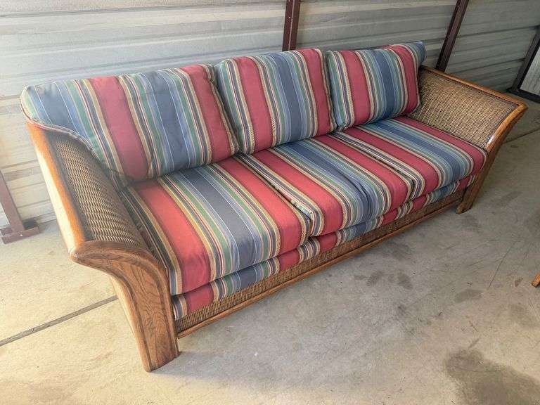 Striped Serenity: Wicker and Wood Frame Sofa image