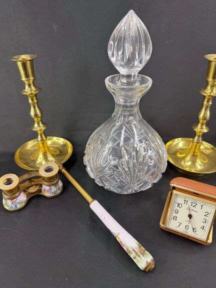 Vintage Decorative Items Grouping: Clock, Binoculars, Decanter, and Candlesticks image