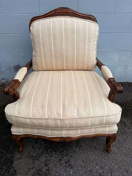 Elegant Carved Wood Armchair with Cane Back image