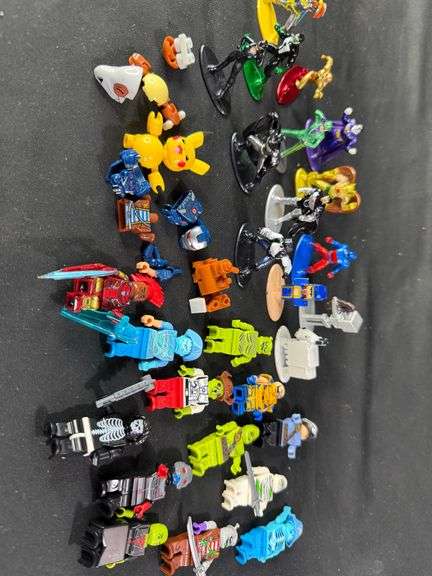Motley Crew of Minifigures: A Collection of Characters Ready for New Adventures! image