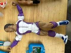 Collection of Wrestling Action Figures with Money in the Bank Briefcase
