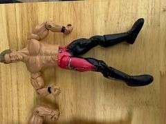 Collection of Wrestling Action Figures with Money in the Bank Briefcase