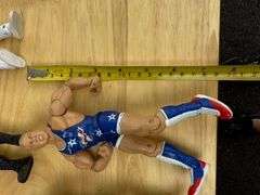 Collection of Wrestling Action Figures with Money in the Bank Briefcase
