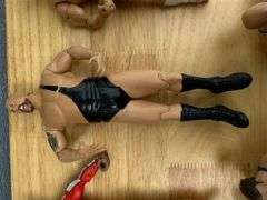 Collection of Wrestling Action Figures with Money in the Bank Briefcase