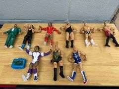 Collection of Wrestling Action Figures with Money in the Bank Briefcase