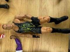 Collection of Wrestling Action Figures with Money in the Bank Briefcase