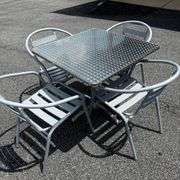 Silver Metal Outdoor Patio Table with Four Chairs