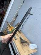 Assorted Garden Tools: Shovels, Rakes, Hedge Trimmers, and More