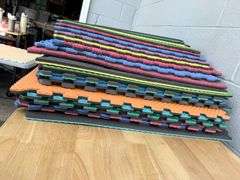 Stack of Interlocking Foam Floor Mats