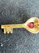 Collection of 14K Charms: Earth, Key, and Ladybug