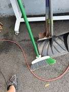 Assorted Garden Tools: Shovels, Rakes, Hedge Trimmers, and More