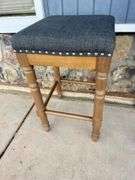 Set of Three Gray Upholstered Stools