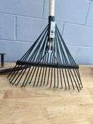 Assorted Garden Tools: Shovels, Rakes, Hedge Trimmers, and More