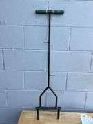 Assorted Garden Tools: Shovels, Rakes, Hedge Trimmers, and More
