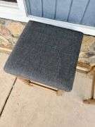 Set of Three Gray Upholstered Stools