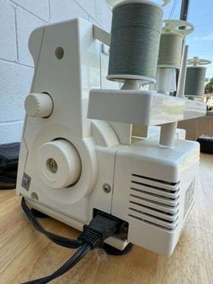 Singer Ultralock Serger Sewing Machine with Accessories and Sewing Patterns