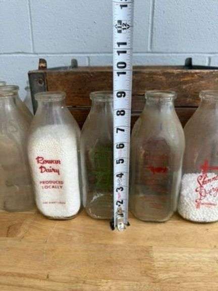 Collection of Glass Milk Bottles with Wooden Crate