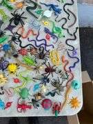 Collection of Plastic Insects and Snake Toys
