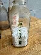 Collection of Glass Milk Bottles with Wooden Crate
