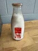 Collection of Glass Milk Bottles with Wooden Crate