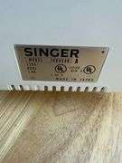 Singer Ultralock Serger Sewing Machine with Accessories and Sewing Patterns